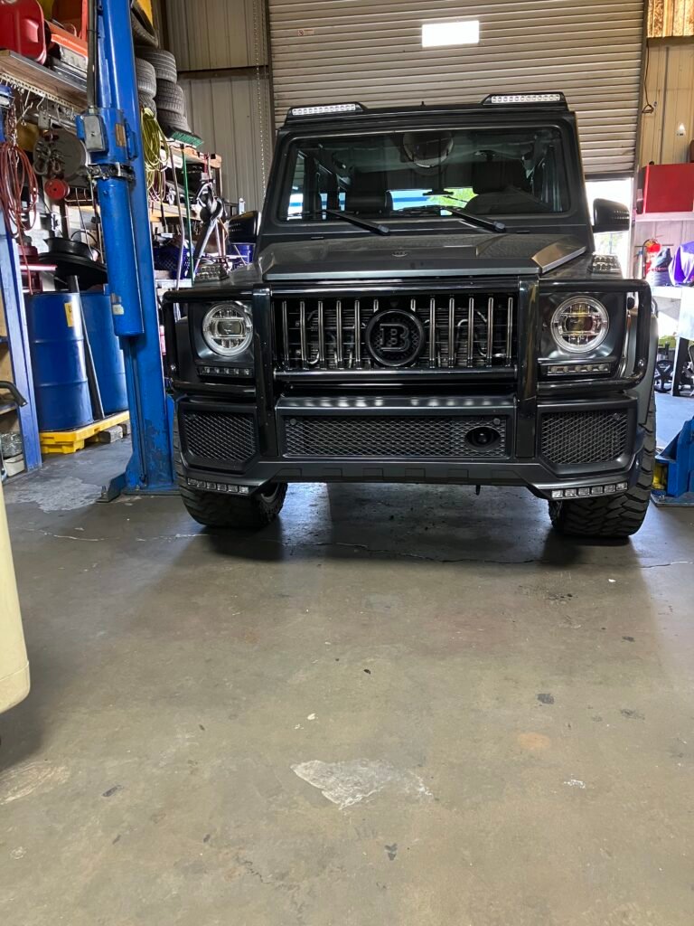 Mercedes-Benz G-Class SUV inside B & B Motorsports automotive repair shop in Las Vegas
